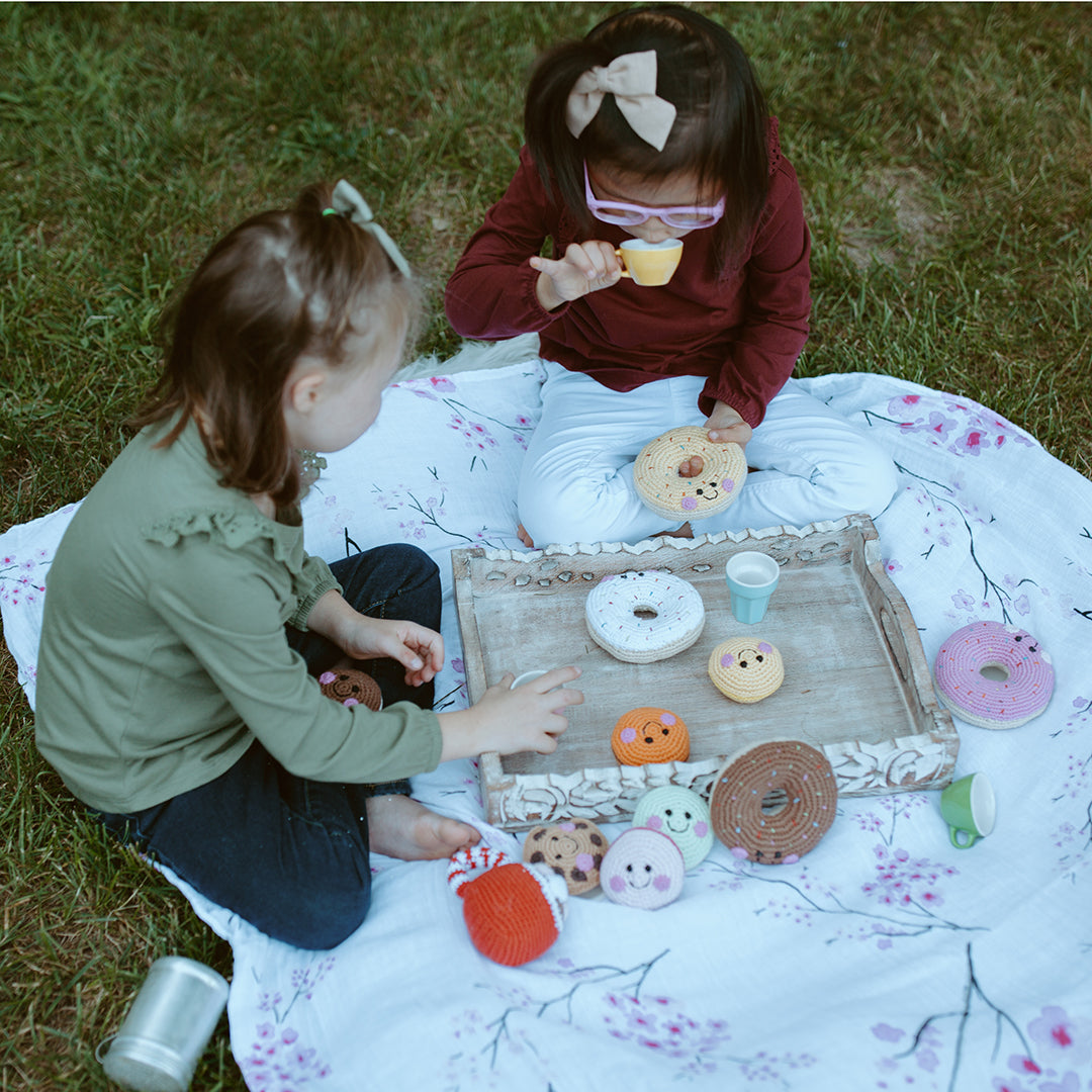 Tea party with handmade crochet organic cotton doughnut soft toys