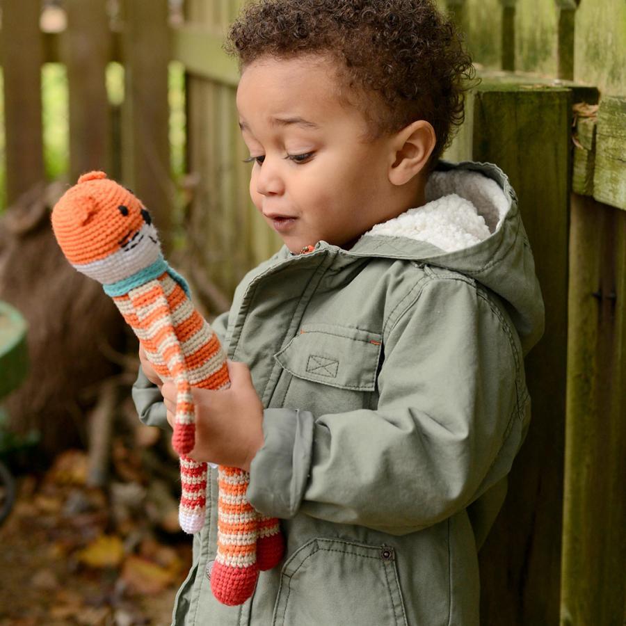 Boy playing with Handmade Crochet Fox Stuffed Animal