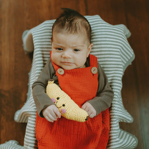 Baby with Fair Trade Crochet Banana Rattle