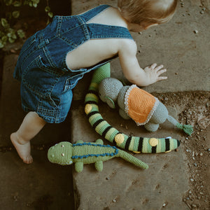 Boy with Crochet Crocodile, Snake and Elephant